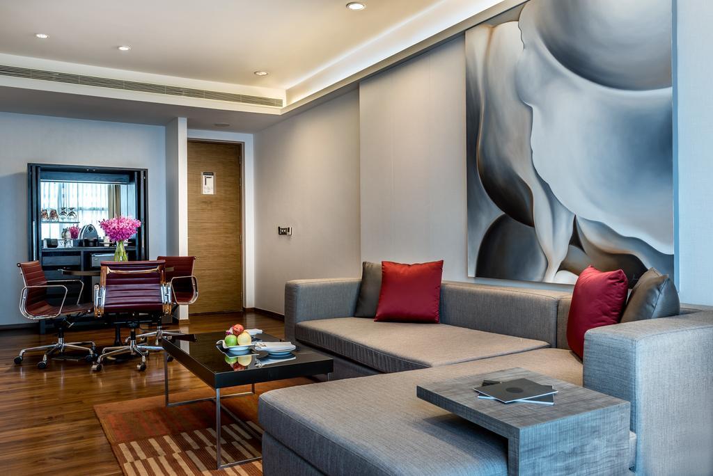 Pullman Bangkok King Power Hotel Екстериор снимка A living room in a suite at the hotel